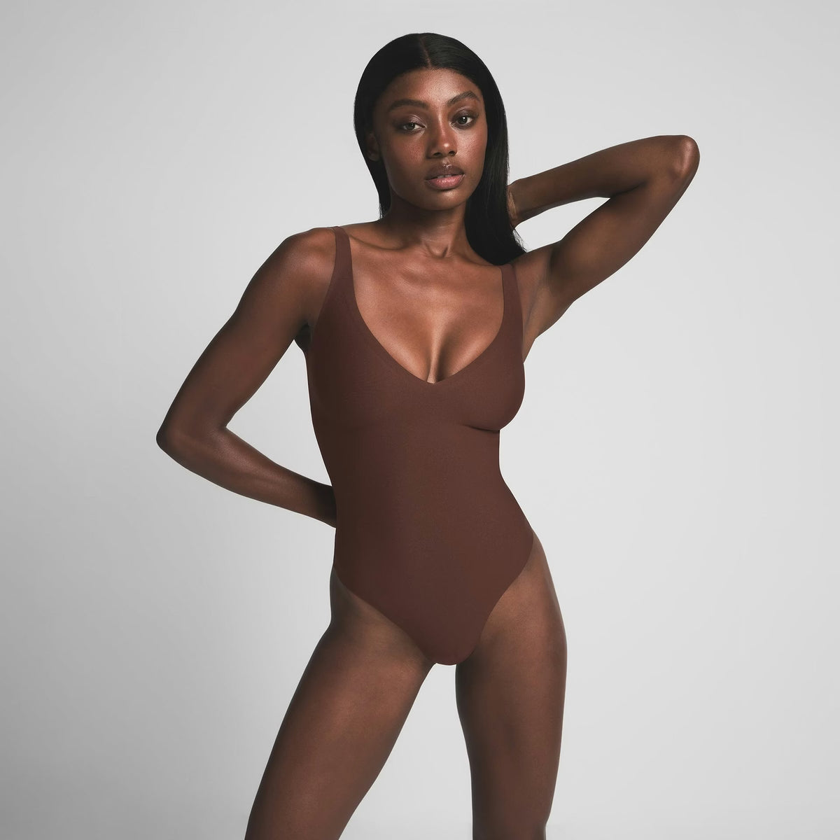 SKIMS BODY UNLINED PLUNGE THONG BODYSUIT