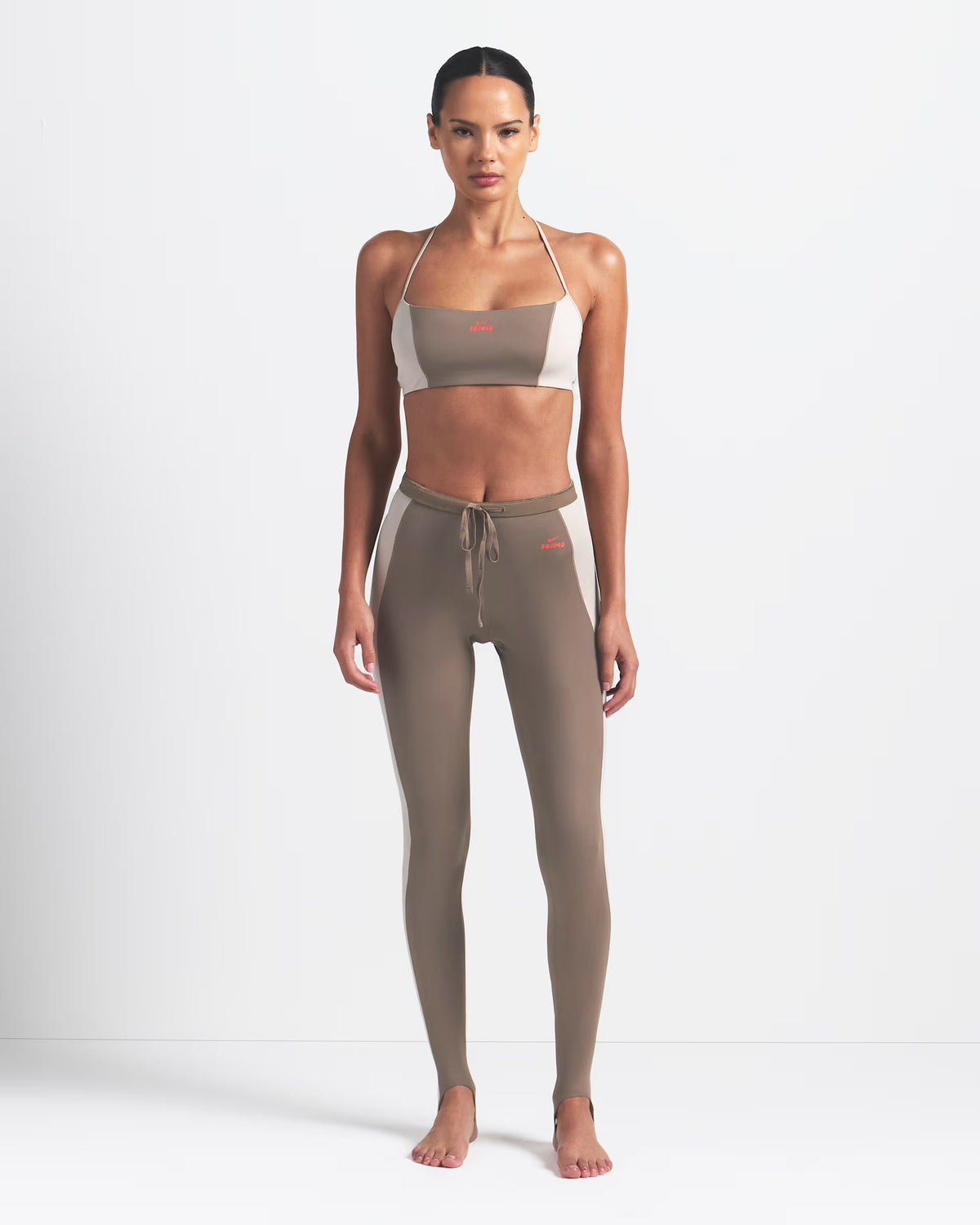 Nike SKIMS high waisted 26'' stirrup leggings