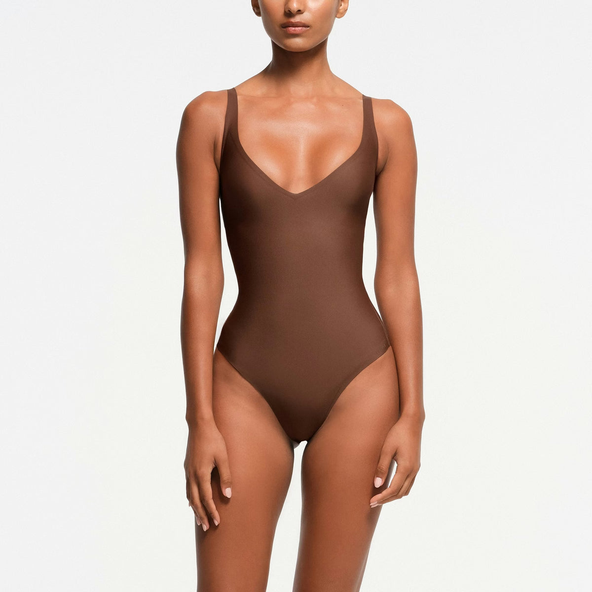 SKIMS BODY UNLINED PLUNGE THONG BODYSUIT